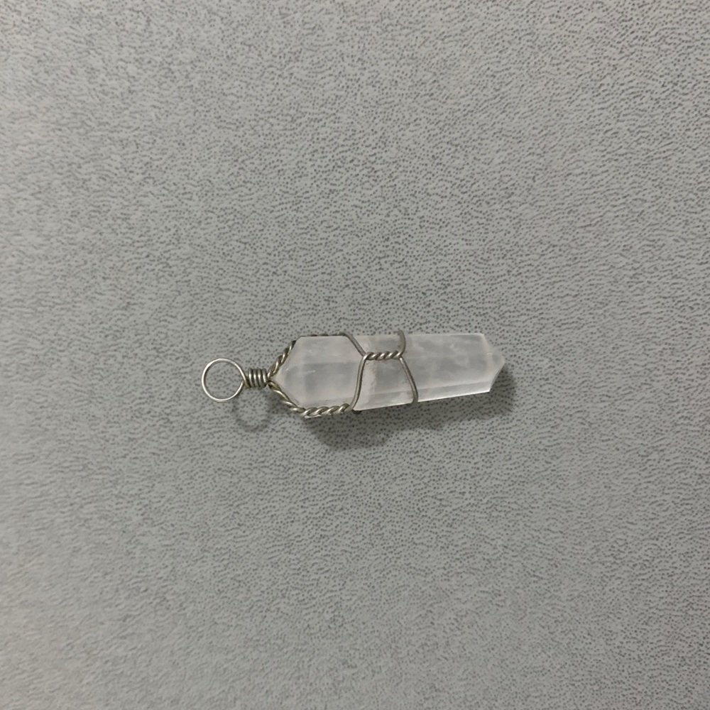 white gemstone pendant